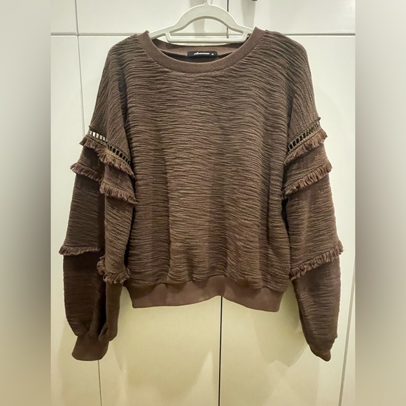 Relaxed round neck pullover sweater with full and decorative sleeves. - Picture 1 of 4